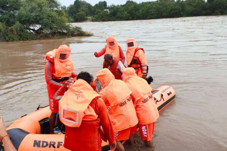 NDRF rescues 14,200 in 12 flood affected Assam districts : 1 NDRF rescues 14,200 in 12 flood affected Assam districts :